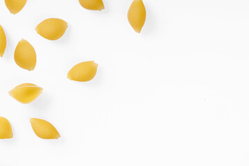 Pasta products in the form of a shell, texture, on a white background