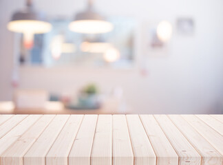 elective focus.Wood table top on blur living room or kitchen  background