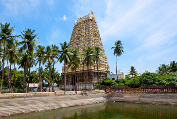 Gopura (tower) and temple tank of Lord Bhakthavatsaleswarar Temple. Built by Pallava kings in 6th...