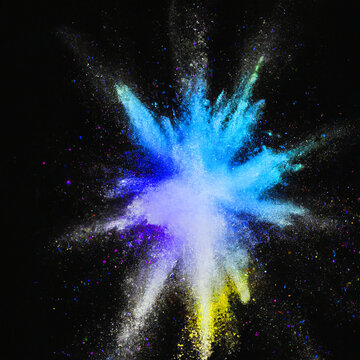 A centered explosion of colorful powder on a black background, colorful paint splash