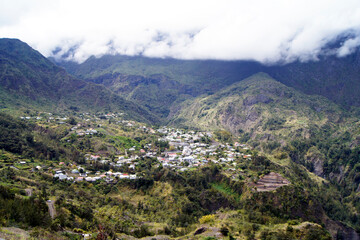 Naklejka premium Population in the Cilaos circus, Reunion Island, France