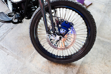 Detailed custom chrome spoke wheel of custombike custom motorcycle or chopper bike