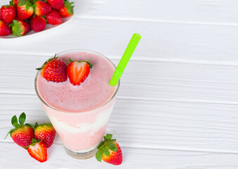 Strawberry yogurt fruit juice smoothie pink colorful fruit juice milkshake blend beverage healthy high protein the taste yummy In glass drink episode morning on white wood background.