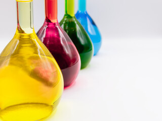 Glass chemistry in a white background. Selective focus