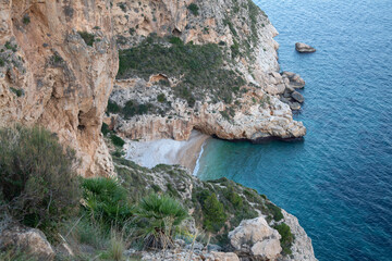 Landscape at Moraig Cove Beach with Cliff; Alicante; Spain - 591559511
