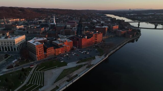 Aerial view of downtown Troy, New York and Hudson River at sunset