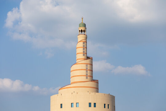 oah, Qatar - December 12 2022: The Al Fanar Building is one of the most famous landmarks in Doha, characterized by its spiral shape, and is located near Souq Waqif