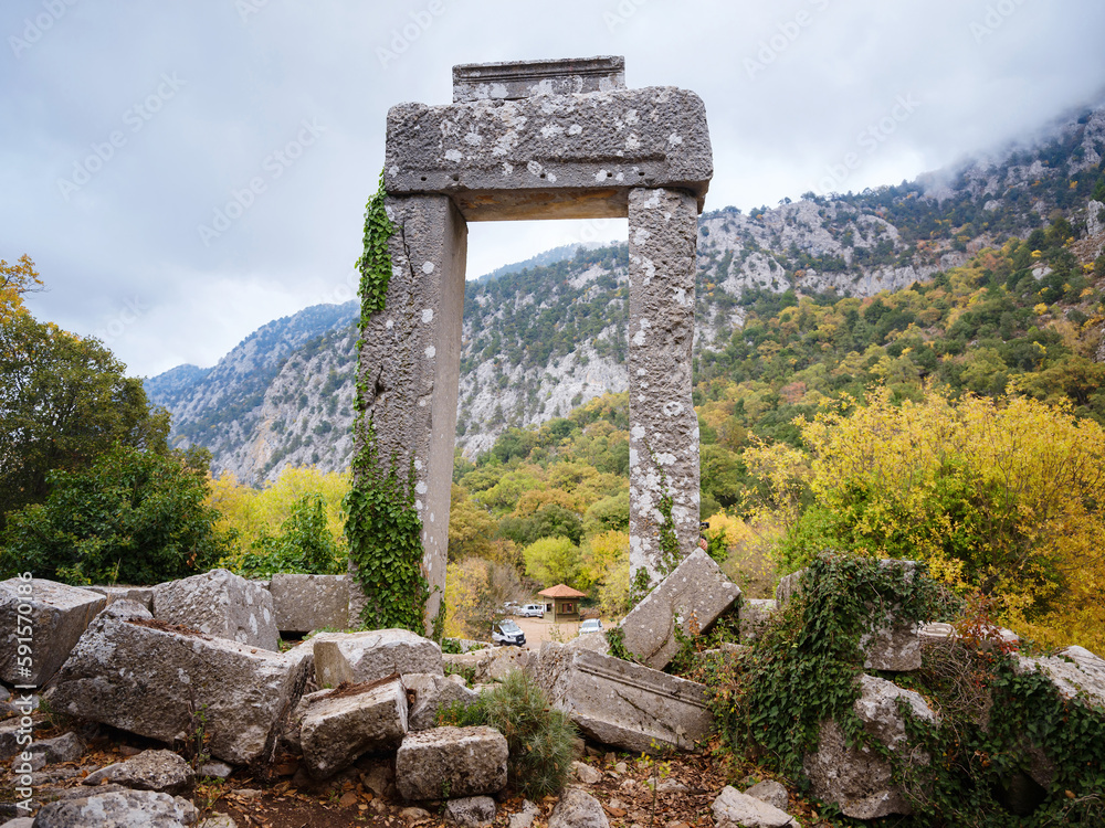 Wall mural Autumn walk by Termessos Ancient City, Turkey. Turkeys most outstanding archaeological sites and one of main tourist center. gate to the Temple of Artemis. - Wall murals