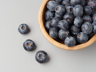Fresh organic blueberries in a bowl closeup view
