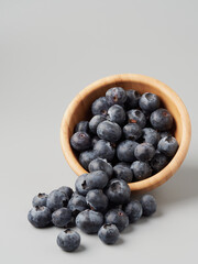 Fresh organic blueberries in a bowl closeup view