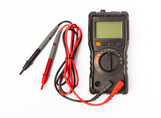 Digital multimeter with probes and display isolated on white background. Electrical tool.Black digital multimeter with probes on a white background, the multimeter is an electronic measuring instrumen