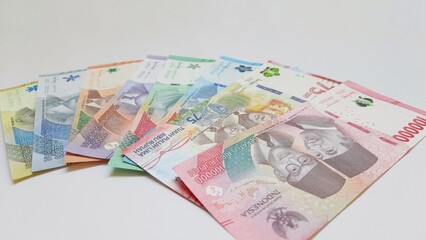 Indonesia banknotes paper money rupiah new series. Indonesian currency IDR for payments and buying and selling isolated on white background