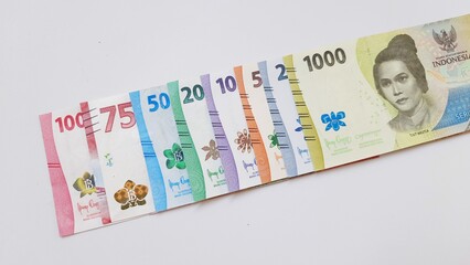 Indonesia banknotes paper money rupiah new series. Indonesian currency IDR for payments and buying and selling isolated on white background
