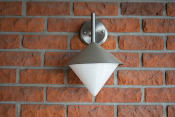 lamp on a brick wall