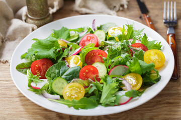 plate of salad with fresh vegetables
