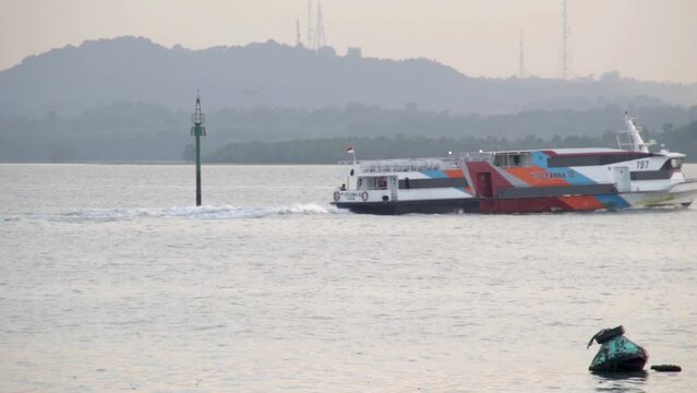 Batam City, Indonesia - April 8, 2023: Fast ferry passenger transport route from Harbor Bay to Tanjung Balai Karimun take place at the Harbor Bay.