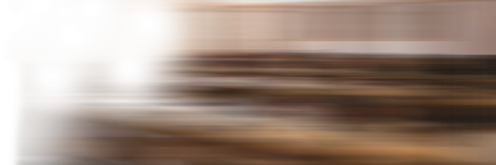 Defocused image of computers on table