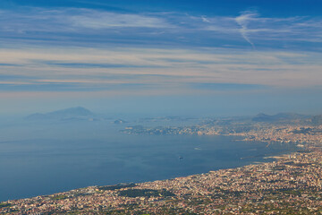 Panoramic view from volcano Mount Vesuvius on the bay of Naples, Province of Naples, Campania region, Italy, Europe. Looking at the island of Capri and Mediterranean coastline on a cloudy day.