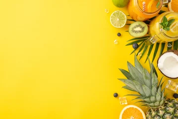 Poster Add a pop of color to your summer marketing with this vibrant top view flat lay photo of citrus juice cocktails in glass jars, ananas, orange, kiwi set against a trendy yellow background © ActionGP