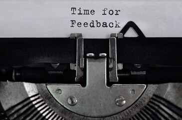 Text Time for Feedback typed on retro typewriter