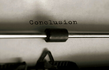 Text Conclusion typed on retro typewriter