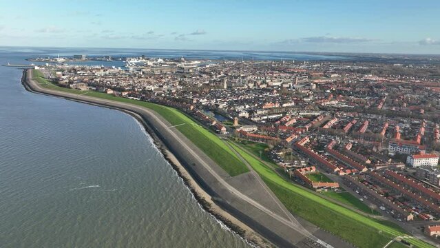 Den Helder's breathtaking coastline viewed from above, where the ocean meets the bustling city.