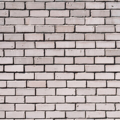Grayscale backdrop with old realistic white brick wall. Minimal fragment of brickwall close-up. Minimalist monochrome background with wall of gray bricks in different shades. Simple wall texture.
