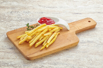 French fried potato over board