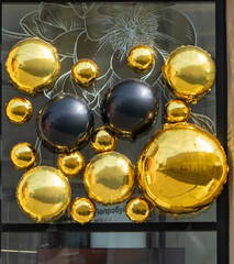 gold spheres on a black background