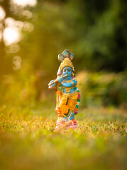 Beautiful Krishna sculpture image, Vishu greetings background © forclick