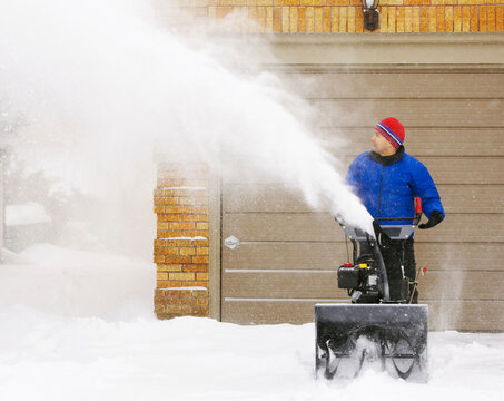 Man Using Snow Blower