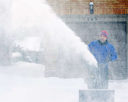 Man Using Snow Blower