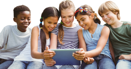 Children using digital tablet at park