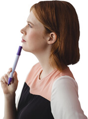 Thoughtful businesswoman holding felt tip pen