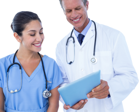 Smiling male doctor with nurse using digital tablet