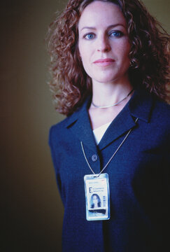 Portrait of Businesswoman with ID Card