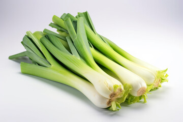 A bunch of green onions on a white background