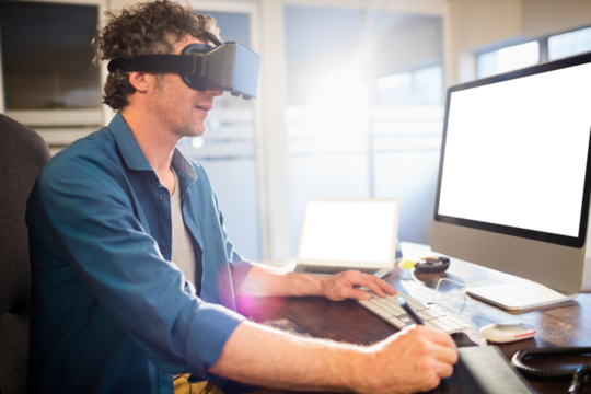 Businessman wearing virtual glasses