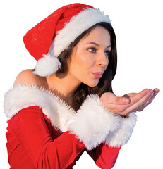 Pretty girl in santa outfit blowing