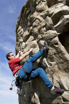 Man Climbing Rock, Alberta, Canada