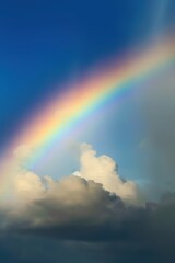 Naklejka na ściany i meble rainbow over stormy sky with clouds