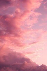 Obraz premium some clouds are over a pink sky