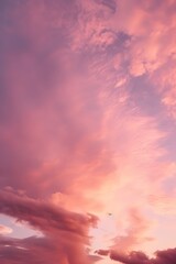 Naklejka na ściany i meble a pinkish sunset with clouds on high octane backgrounds