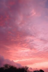 a pinkish sunset with clouds on high octane backgrounds