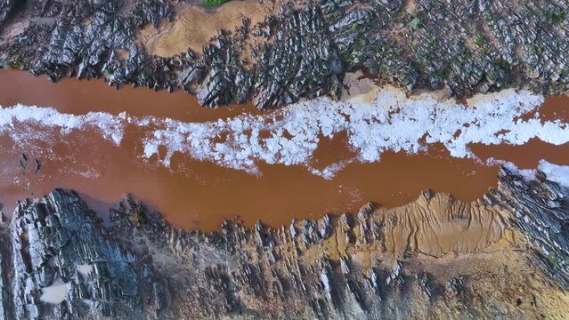 Rio Tinto textures. Aerial view from a drone in the surroundings of the town of Berrocal. Sierra Morena, Gulf of C&aacute;diz, Huelva, Andalusia, Spain, Europe