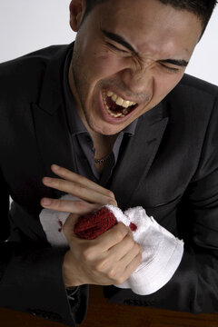 Man with Injured Finger