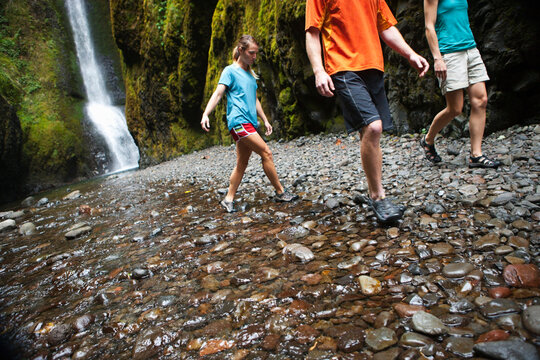 People Hiking in Oneonta Gorge, Oregon, USA