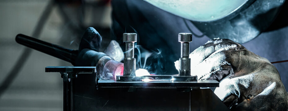 Welder in action in a workshop