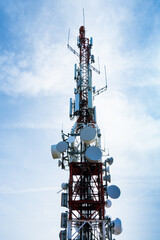 High-quality photo of a 5G antenna tower against a dramatic sky. Perfect for illustrating the technology and connectivity of modern mobile networks