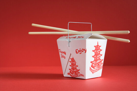 Carton of Chinese Food with Chopsticks